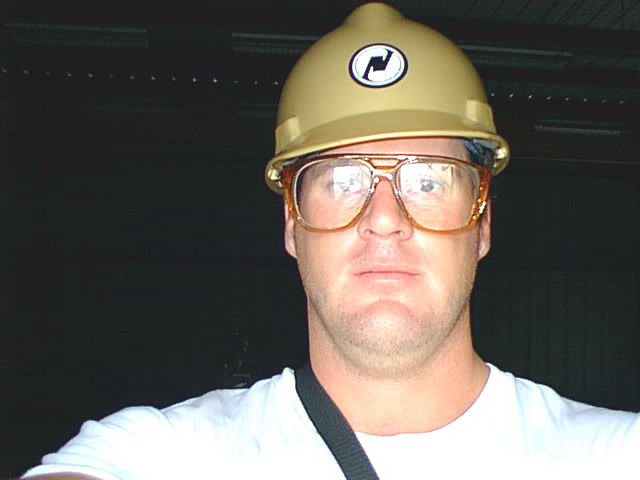 Neil in a hard hat during his years as an environmental technician